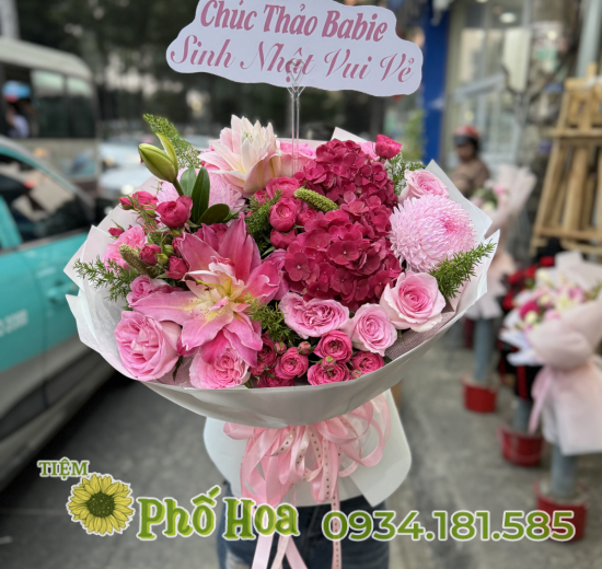 Bó tông hồng mix nhiều loại hoa